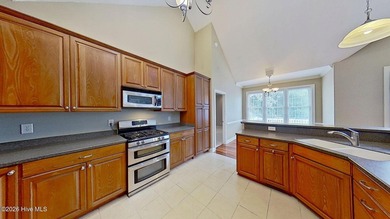 Discover refined coastal living in this beautifully maintained - photo 15