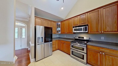 Discover refined coastal living in this beautifully maintained - photo 16