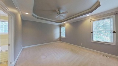 Discover refined coastal living in this beautifully maintained - photo 18