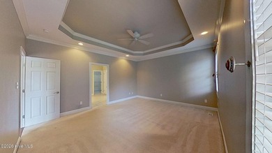 Discover refined coastal living in this beautifully maintained - photo 19
