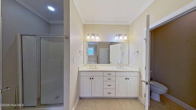 Discover refined coastal living in this beautifully maintained - photo 22