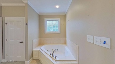 Discover refined coastal living in this beautifully maintained - photo 23