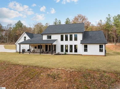 Experience luxurious modern farmhouse living on 5 wooded acres - photo 36