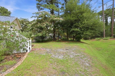 Discover refined coastal living in this beautifully maintained - photo 49