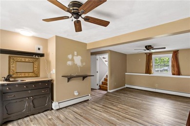 Discover the potential of this raised ranch located in the - photo 27
