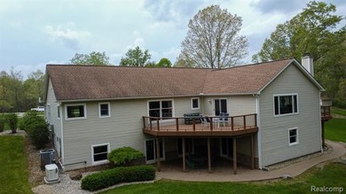 Nestled deep within 4.3 breathtaking wooded acres and offering - photo 3