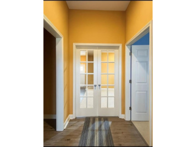 Located between Basehor and Lansing with over an acre of