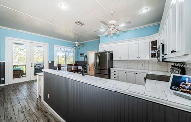 5127 Bay Blvd, Port Richey, FL 34668 Waterfront Home with Canal - photo 10