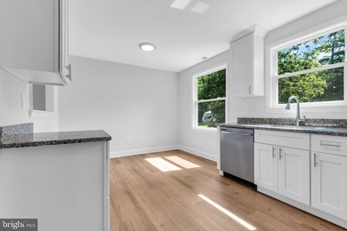 Beautifully renovated 3-bedroom, 2-full-bath home located in the - photo 13