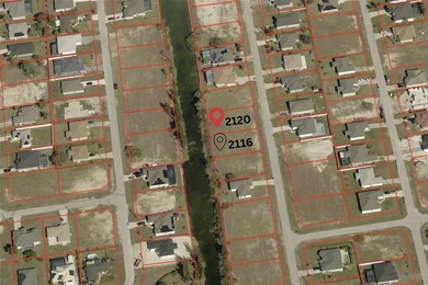 Discover 0.23-acre of pristine freshwater frontage, with one - photo 1