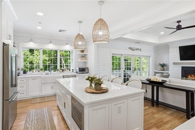 Welcome to 7 Waterview Lane, a custom-built home in the highly - photo 14
