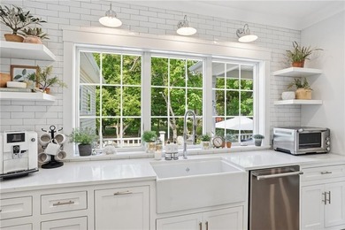Welcome to 7 Waterview Lane, a custom-built home in the highly - photo 16