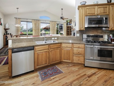 This 4 bed 3 bath single family home in Cotton Ranch features a - photo 18