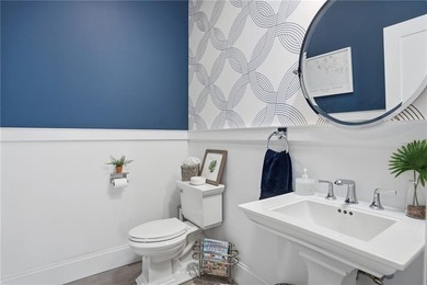 Welcome to 7 Waterview Lane, a custom-built home in the highly - photo 20