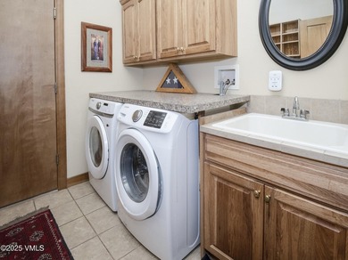 This 4 bed 3 bath single family home in Cotton Ranch features a - photo 20