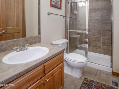 This 4 bed 3 bath single family home in Cotton Ranch features a - photo 24