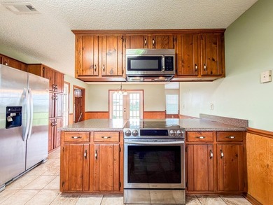 Warm and inviting house nestled on 25.8 acres, this property - photo 11