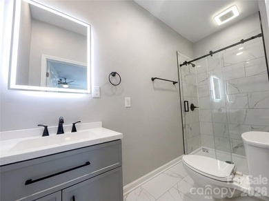 Welcome to 405 Isle Of Pines Rd, a home that exudes comfort and - photo 12