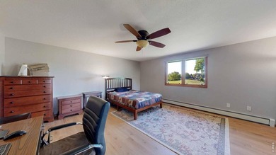 This charming home offers nearly 2,100 finished sq ft with two