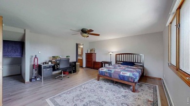 This charming home offers nearly 2,100 finished sq ft with two