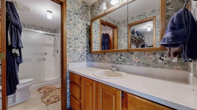 This charming home offers nearly 2,100 finished sq ft with two