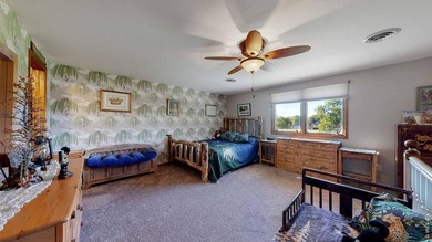 This charming home offers nearly 2,100 finished sq ft with two