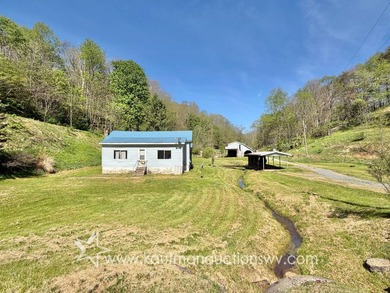 ***AUCTION***Price of $73,700 Reflects the County Appraised - photo 2