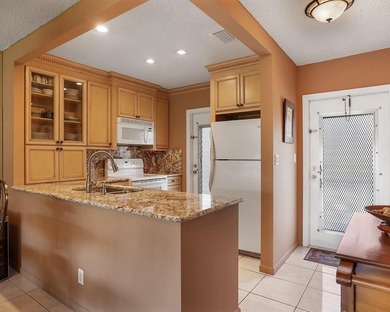 A beautifully remodeled 2-bedroom, 2-bath condo in the 55+ Rose - photo 2