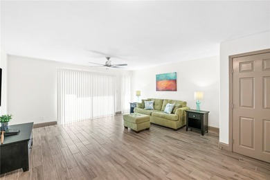 Charming condo featuring fabulous water views on one side and a