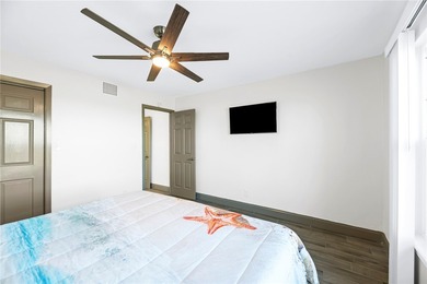 Charming condo featuring fabulous water views on one side and a