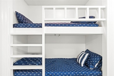 Charming condo featuring fabulous water views on one side and a