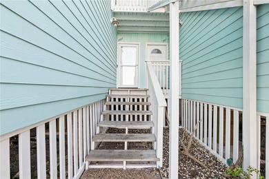 Charming condo featuring fabulous water views on one side and a