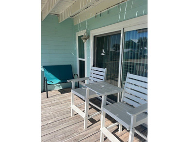 Charming condo featuring fabulous water views on one side and a