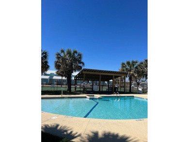 Charming condo featuring fabulous water views on one side and a