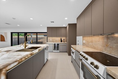 Exquisitely reimagined, this stunning 3-bedroom, 2-bath - photo 7