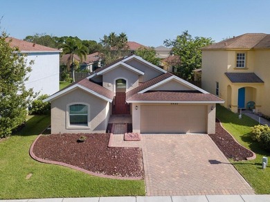 Step inside to a bright, 4BR 2 BA home enhanced by warm wood - photo 1