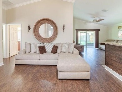 Step inside to a bright, 4BR 2 BA home enhanced by warm wood - photo 6