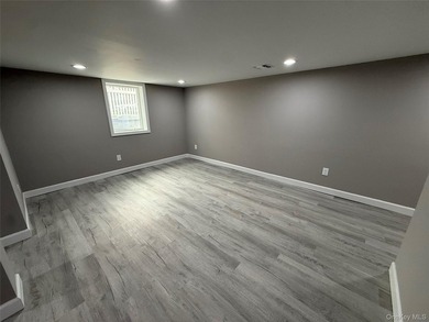 Beautifully renovated 4-bedroom, 2-bath home in Bay Shore - photo 17