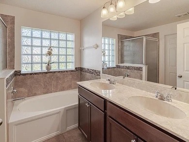Step inside to a bright, 4BR 2 BA home enhanced by warm wood - photo 9