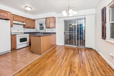 Welcome to 2125 Homer Avenue, a well maintained two-family brick - photo 6