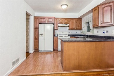 Welcome to 2125 Homer Avenue, a well maintained two-family brick - photo 7