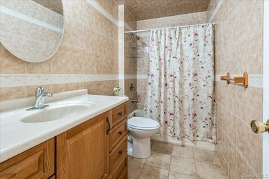 Welcome to 2125 Homer Avenue, a well maintained two-family brick - photo 10