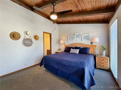 Enjoy lake living at its best in this beautifully maintained