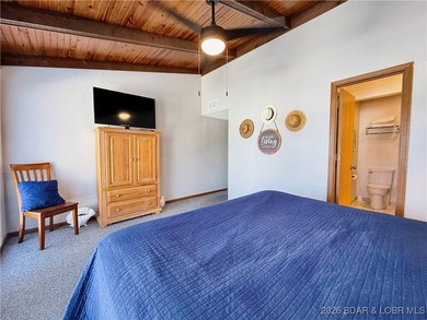 Enjoy lake living at its best in this beautifully maintained