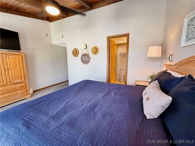 Enjoy lake living at its best in this beautifully maintained