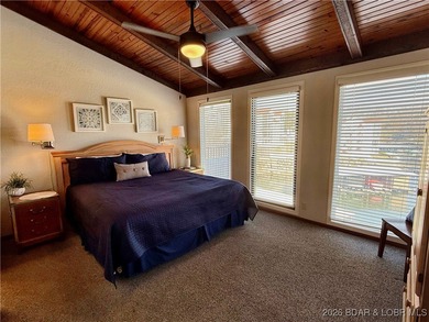 Enjoy lake living at its best in this beautifully maintained