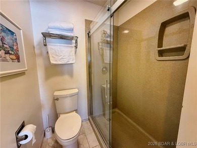 Enjoy lake living at its best in this beautifully maintained