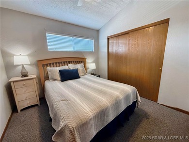 Enjoy lake living at its best in this beautifully maintained