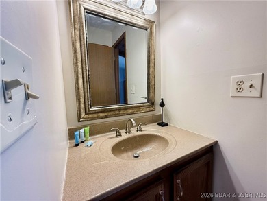 Enjoy lake living at its best in this beautifully maintained - photo 22