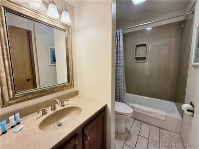 Enjoy lake living at its best in this beautifully maintained - photo 23